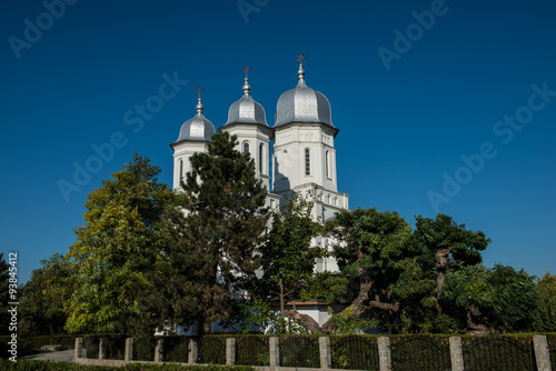 Side view of a romanian church on a blue sky