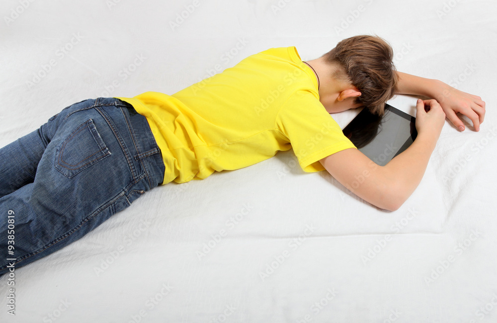 Naklejka premium Kid sleep with Tablet Computer