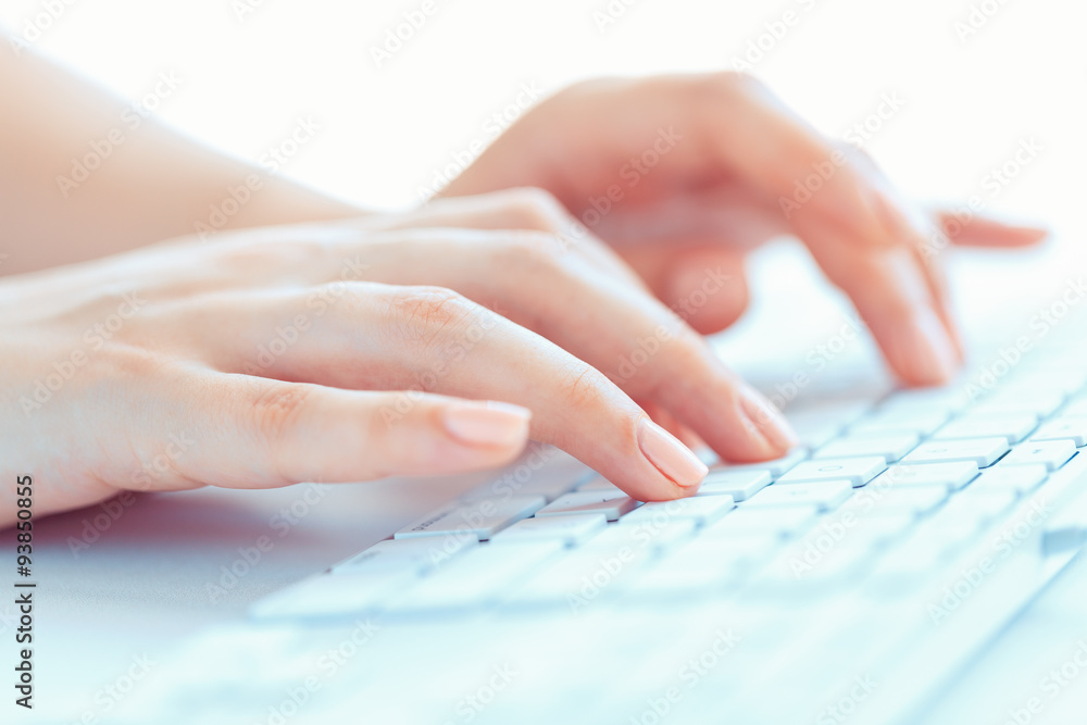 Female hands or woman office worker typing on the keyboard Female hands or woman office worker typing on the keyboard