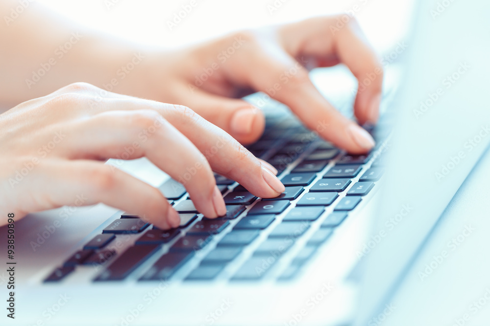 Female hands or woman office worker typing on the keyboard Female hands or woman office worker typing on the keyboard