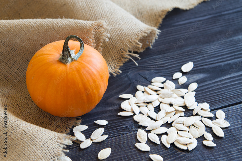 ripe pumpkin on a wooden background ripe pumpkin on a wooden background