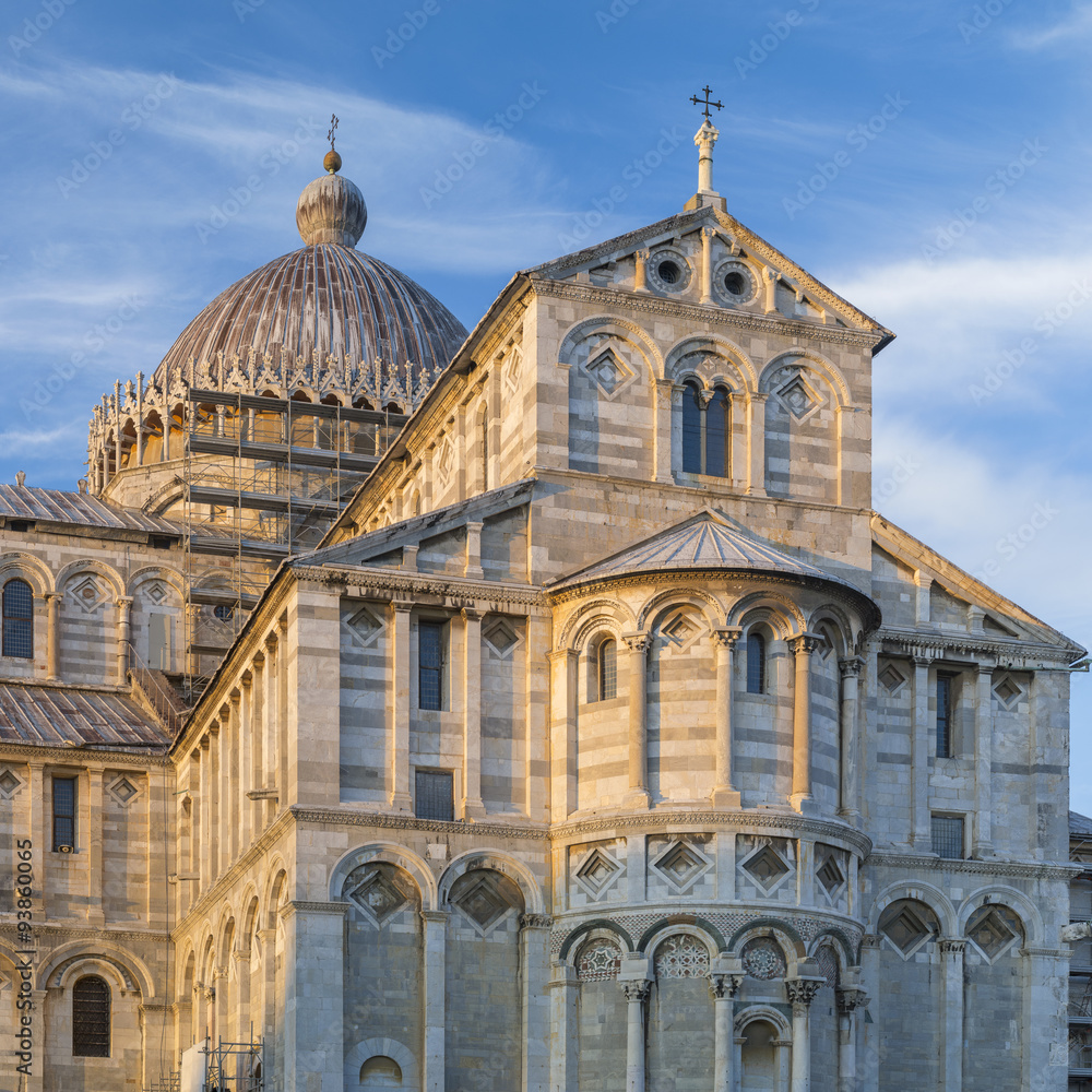 front of cathedral in sunset light in Pisa in Italy