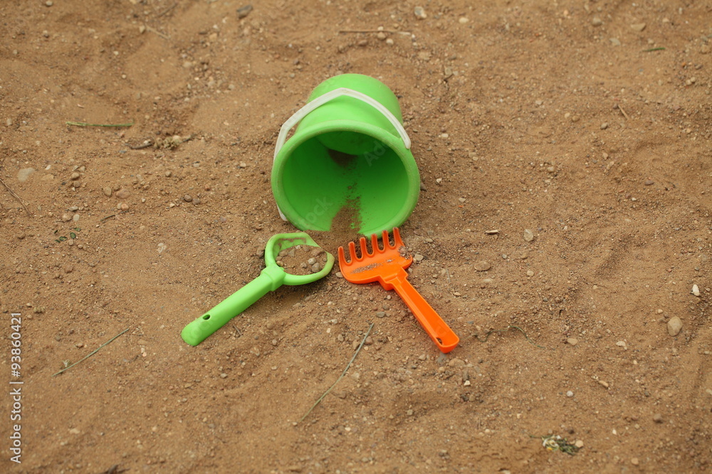 Children's bucket and shovel in the sandbox Children's bucket and shovel in the sandbox
