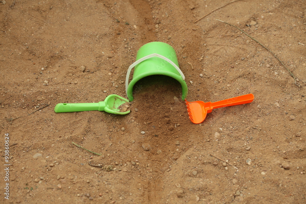 Children's bucket and shovel in the sandbox Children's bucket and shovel in the sandbox