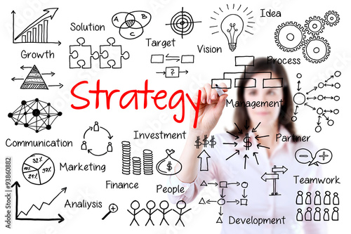Young business woman writing business strategy concept. Isolated on white. 
