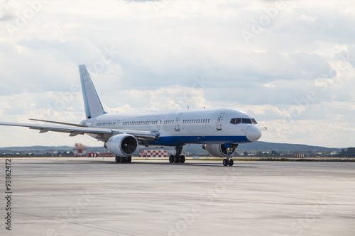 modern aircraft was taxiing on the runway closeup