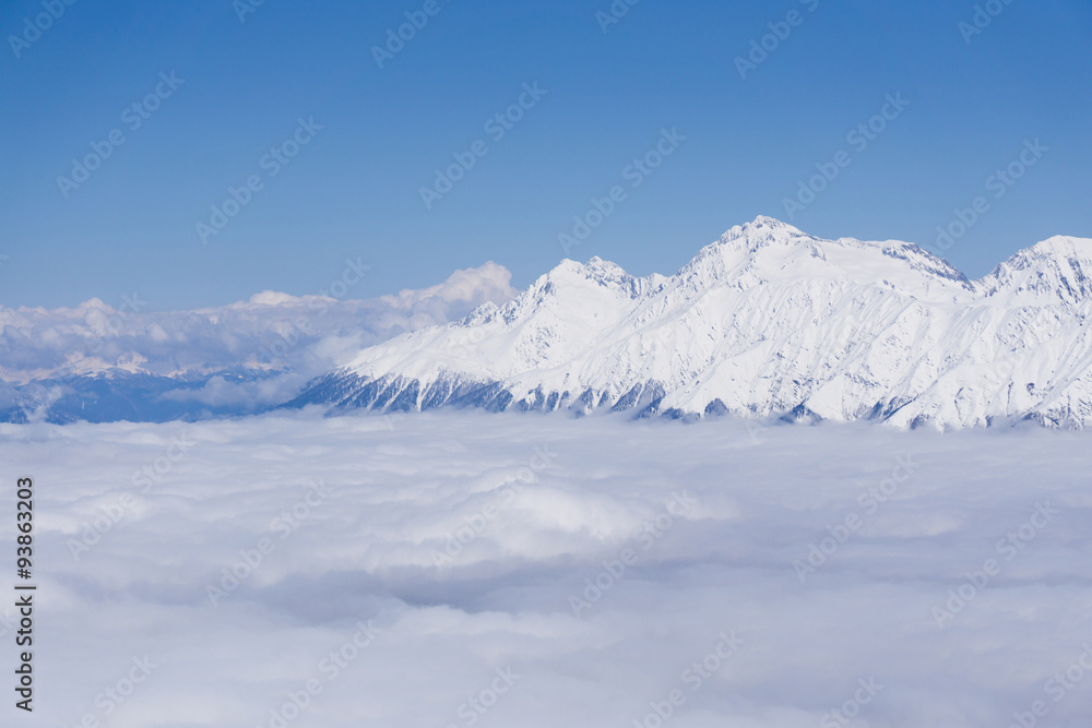 View on mountains and blue sky above clouds, Krasnaya Polyana