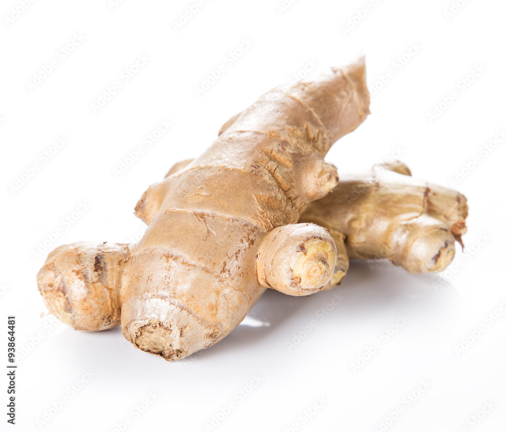 Fresh ginger root on wooden background.