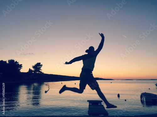 Quadro su tela jumping in the sundowner