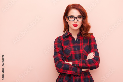 young caucasian girl in glasses photo