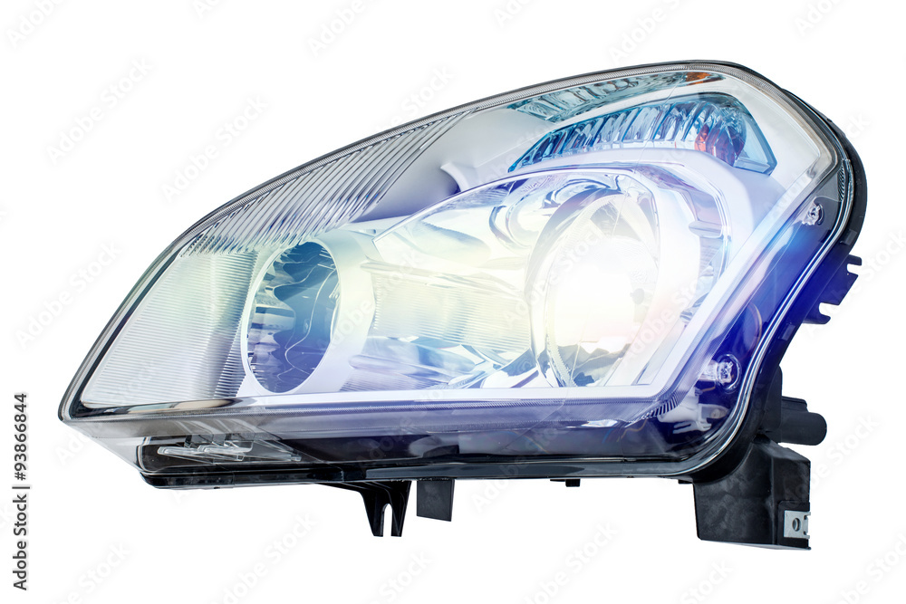 Car headlight on a white background - obrazy, fototapety, plakaty 