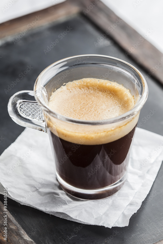 Cup of coffee over a wooden background with hessian sack Cup of coffee over a wooden background with hessian sack