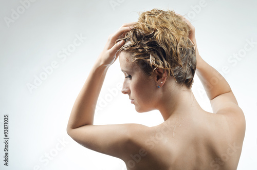 woman washes her beautiful hair
