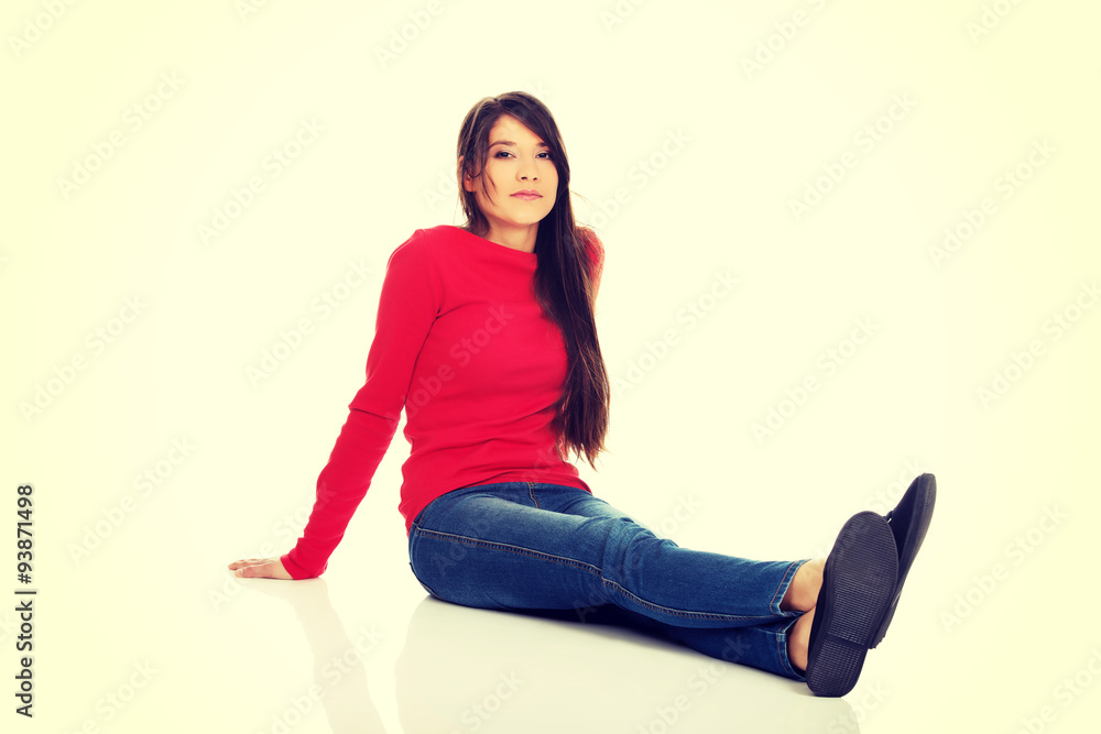 Relaxing woman sitting on the floor. Relaxing woman sitting on the floor.