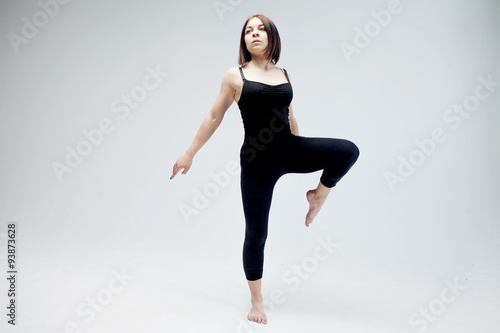 athletic girl posing in Studio, place for your text on the right