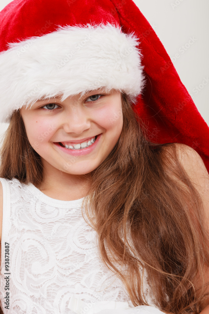 Happy little girl kid in santa hat. Christmas. Happy little girl kid in santa hat. Christmas.