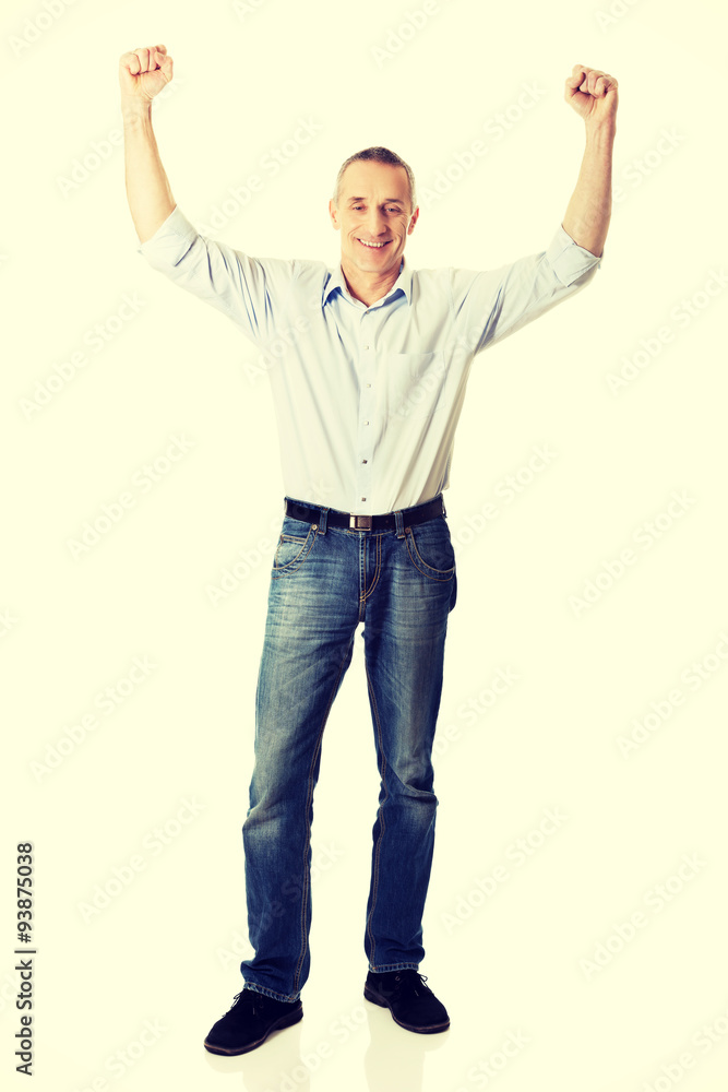 Cheerful man with hands up Cheerful man with hands up