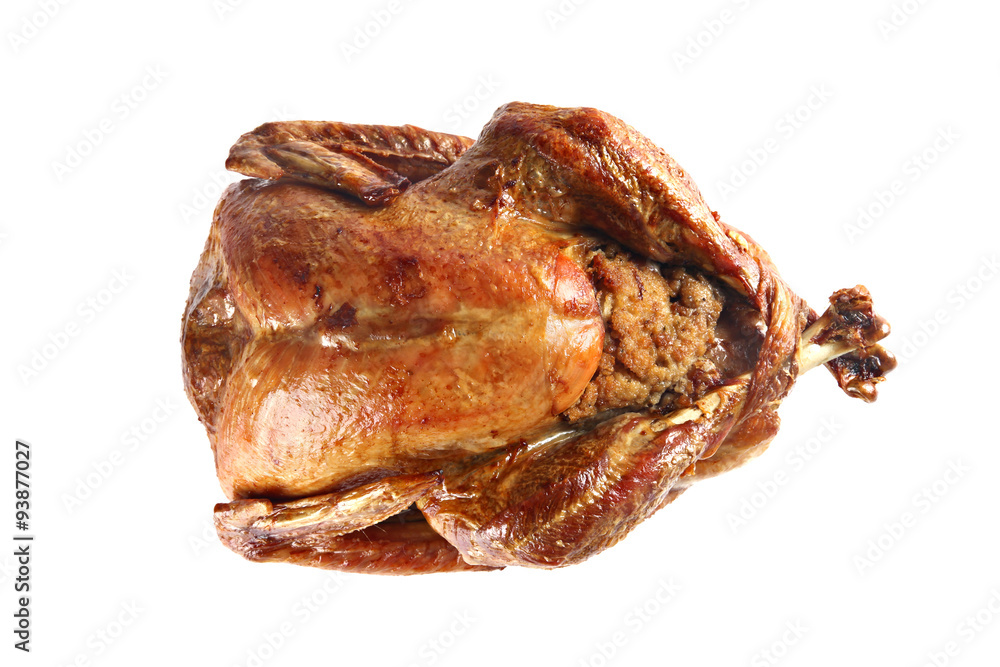Roast turkey isolated on white background, shallow focus Roast turkey isolated on white background, shallow focus
