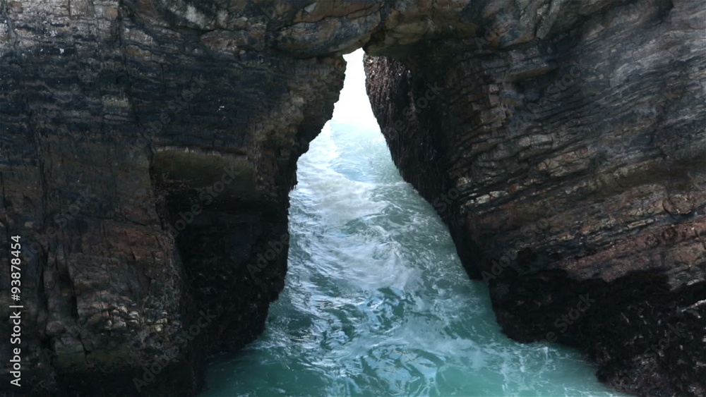 Coastal blow hole or arch in ocean shore HD 5844 Coastal blow hole or arch in ocean shore HD 5844