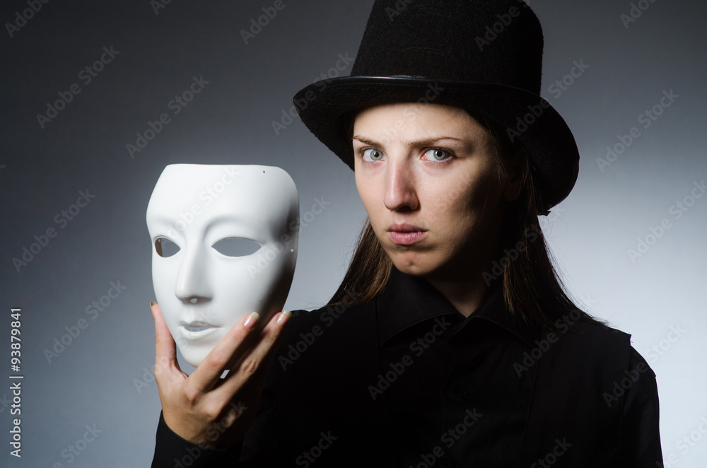 Woman with mask in funny concept Woman with mask in funny concept