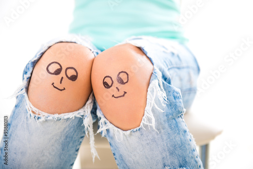 happy together two faces looking at each other, two persons in love drawn on his knees, family relations
 photo