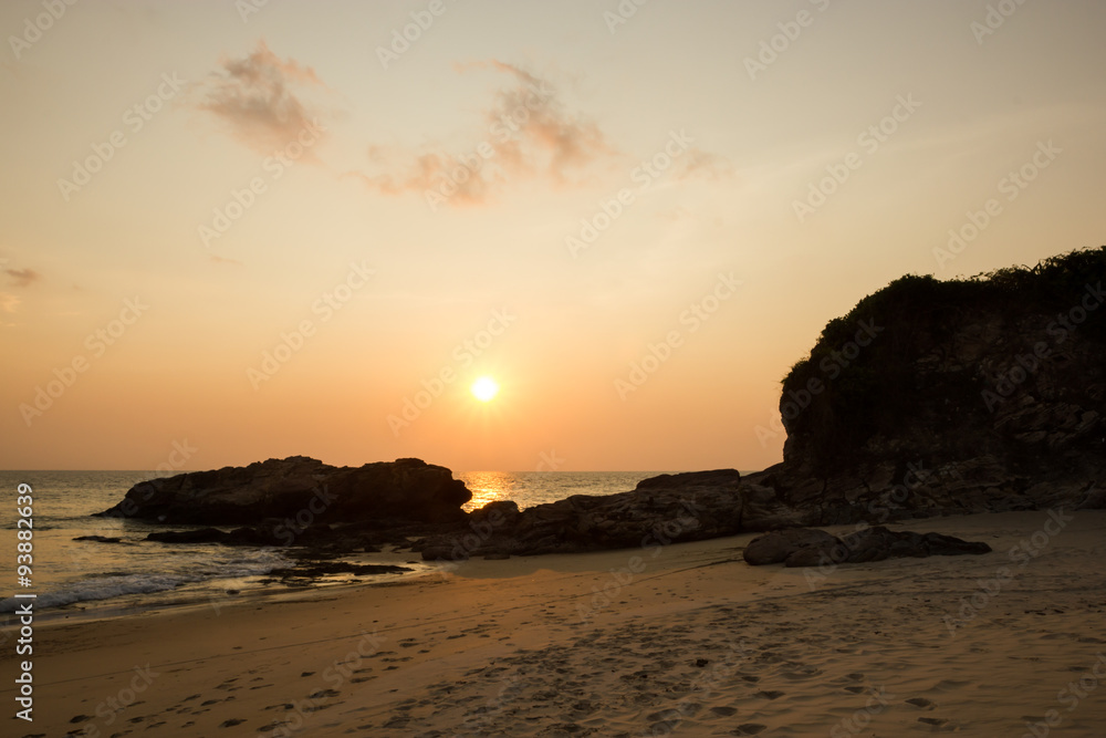 Sunset on the rocks beach