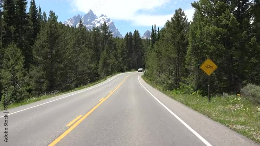 Driving POV Grand Teton NP forest towards mountain 4K Driving POV Grand Teton NP forest towards mountain 4K