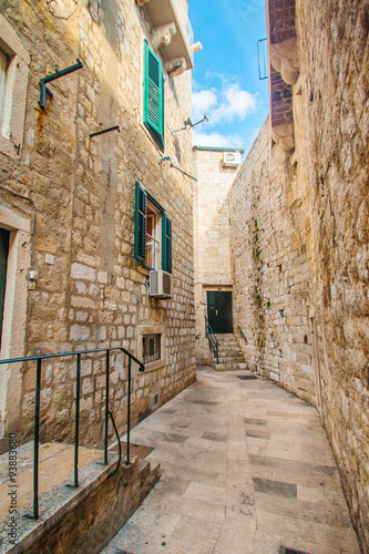 Narrow street and houses walls in the Old Town in Dubrovnik  Croatia