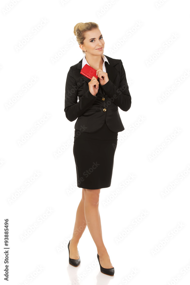 Happy smiling businesswoman with red wallet Happy smiling businesswoman with red wallet