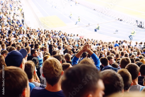 Cuadro en lienzo Fan celebrating in the stands at an football game