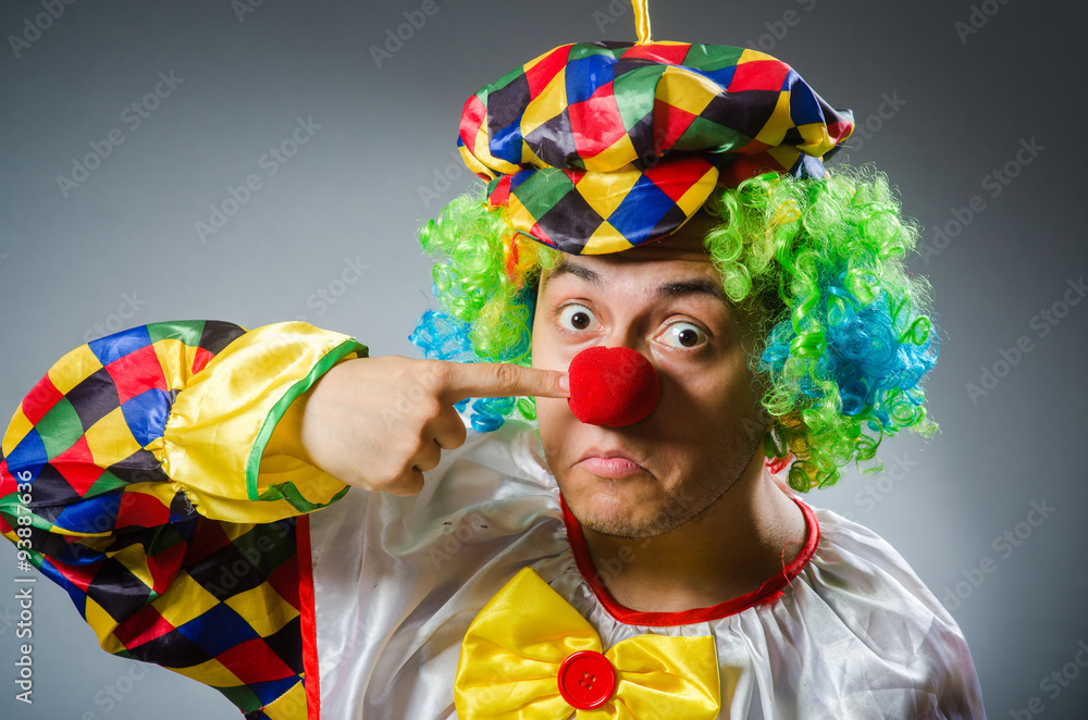 Funny clown in comical concept Funny clown in comical concept