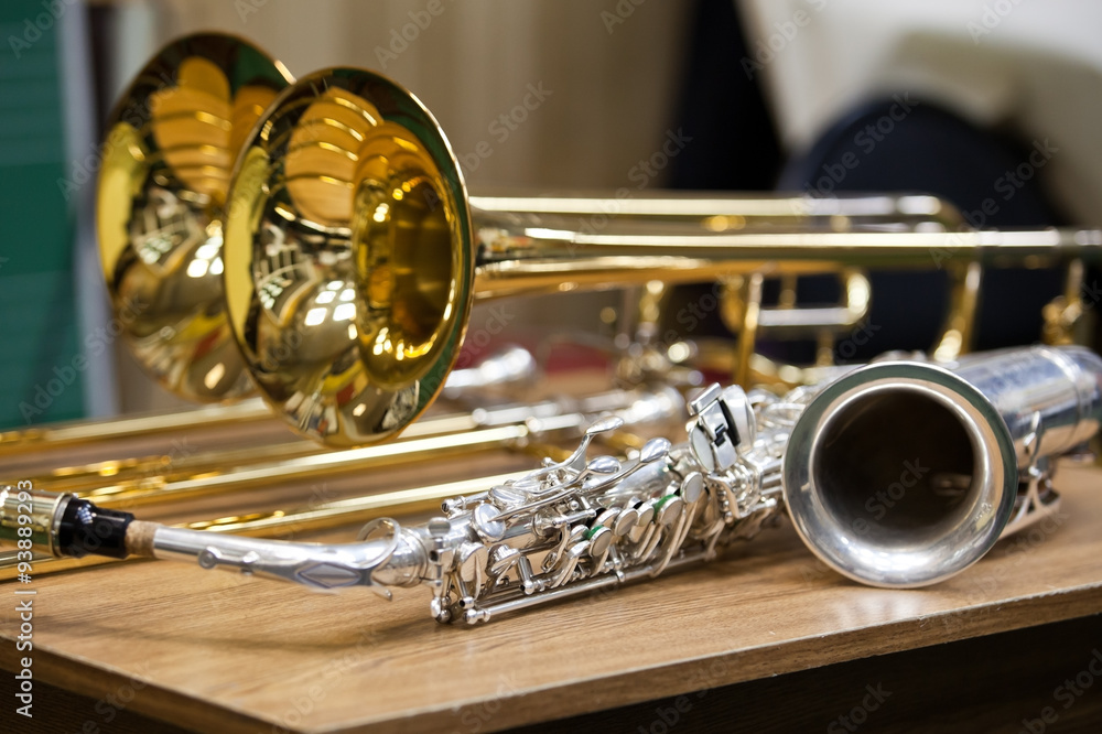 Obraz premium Wind Instruments on the table closeup