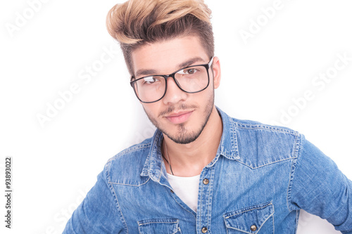 closeup picture of a young man with glasses