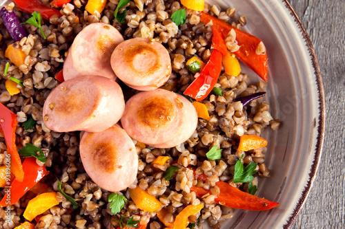 Buckwheat with sausages and vegetables