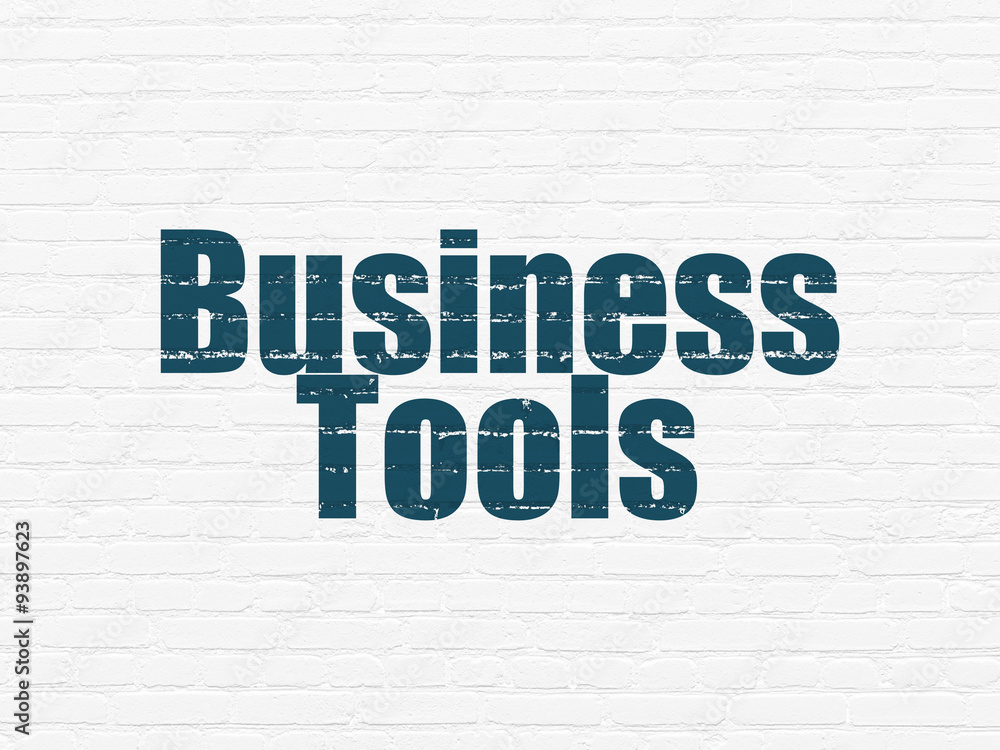 Business concept: Business Tools on wall background Business concept: Business Tools on wall background