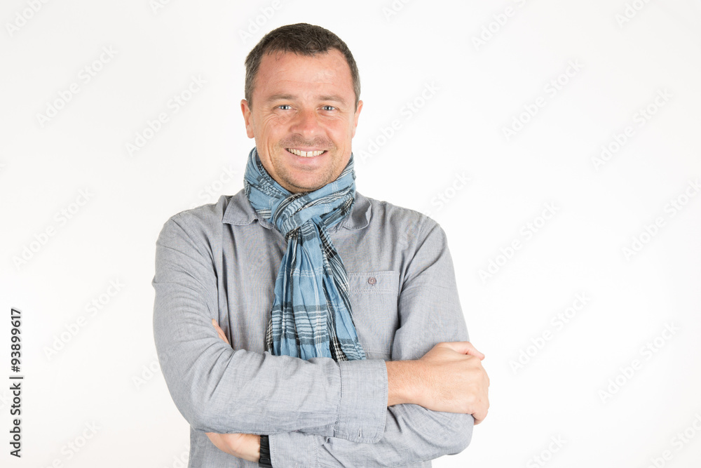 Smart man with scarf looking at the camera Smart man with scarf looking at the camera