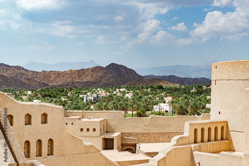 Oasis town of Bahla in Ad Dakhiliyah, Oman. It is located about 200 km southwest of Muscat. Oasis town of Bahla in Ad Dakhiliyah, Oman. It is located about 200 km southwest of Muscat.