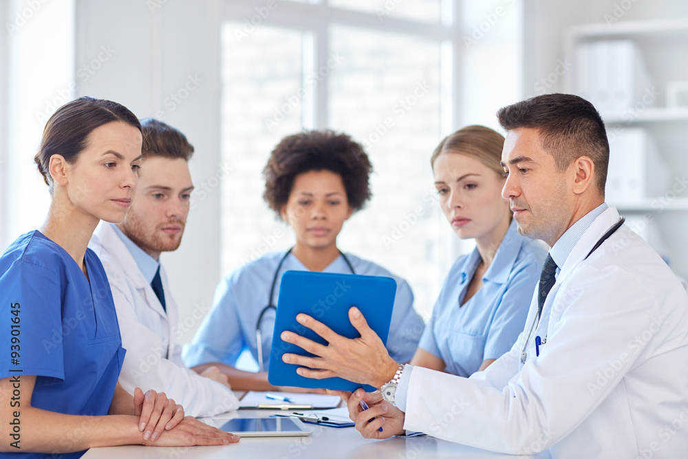 group of happy doctors meeting at hospital office group of happy doctors meeting at hospital office