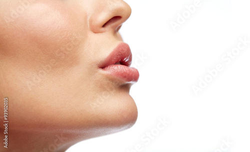 close up of young woman lips photo