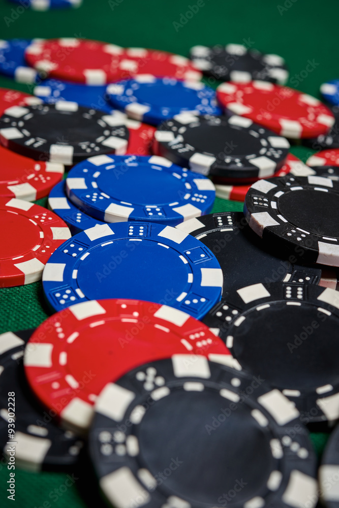 Poker chips on table Poker chips on table