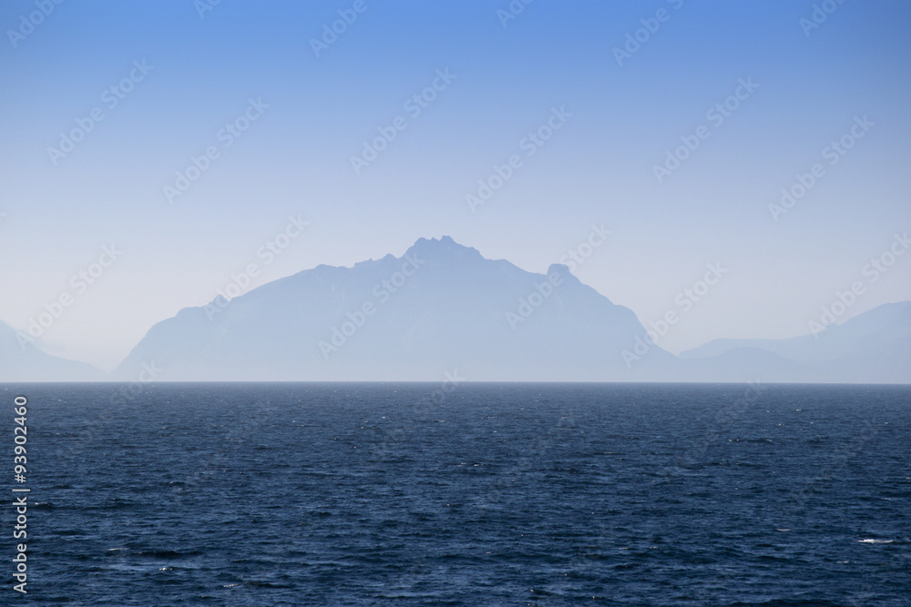 Silhouettes of Lofoten islands in the fog, Norway Silhouettes of Lofoten islands in the fog, Norway