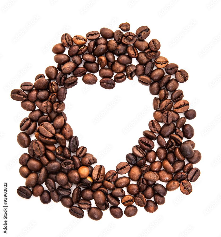 Fine roasted coffee beans with heart shape. All on white background Fine roasted coffee beans with heart shape. All on white background