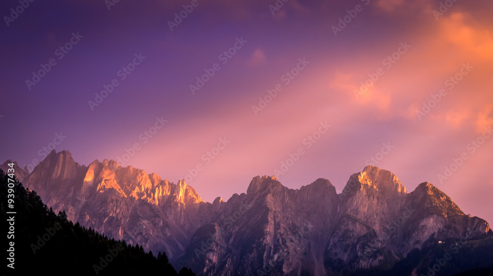 This shot is taken in the Alps when the sun was going down and in this moment it has a special color on the sky. These peaks are located near Gosau village.