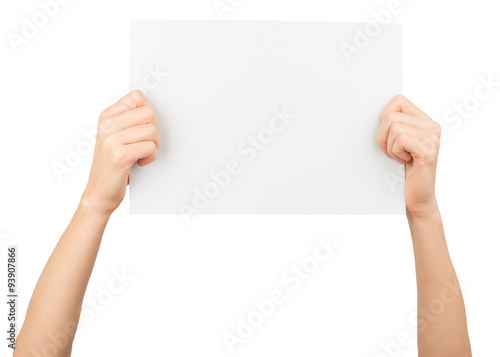 Humans hands holding big blank paper