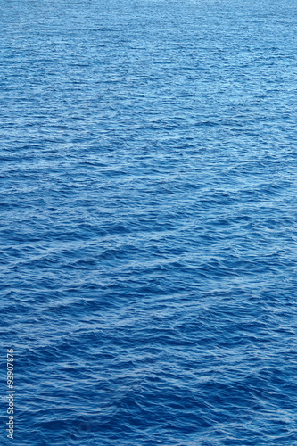 Blue water surface with strong wind