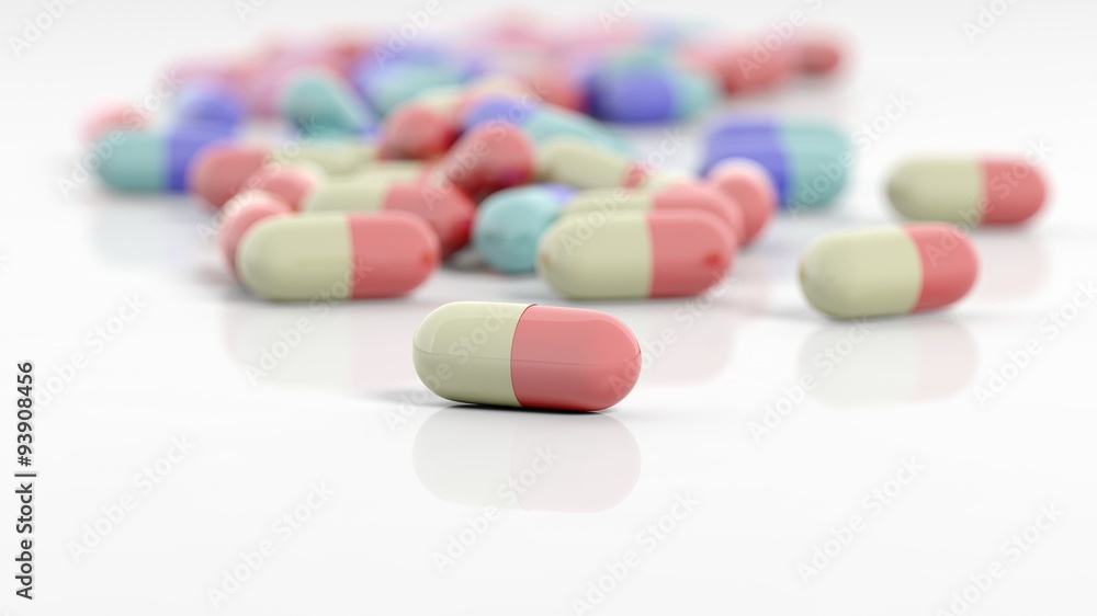 Colorful caplets with depth of field, on white background. Colorful caplets with depth of field, on white background.