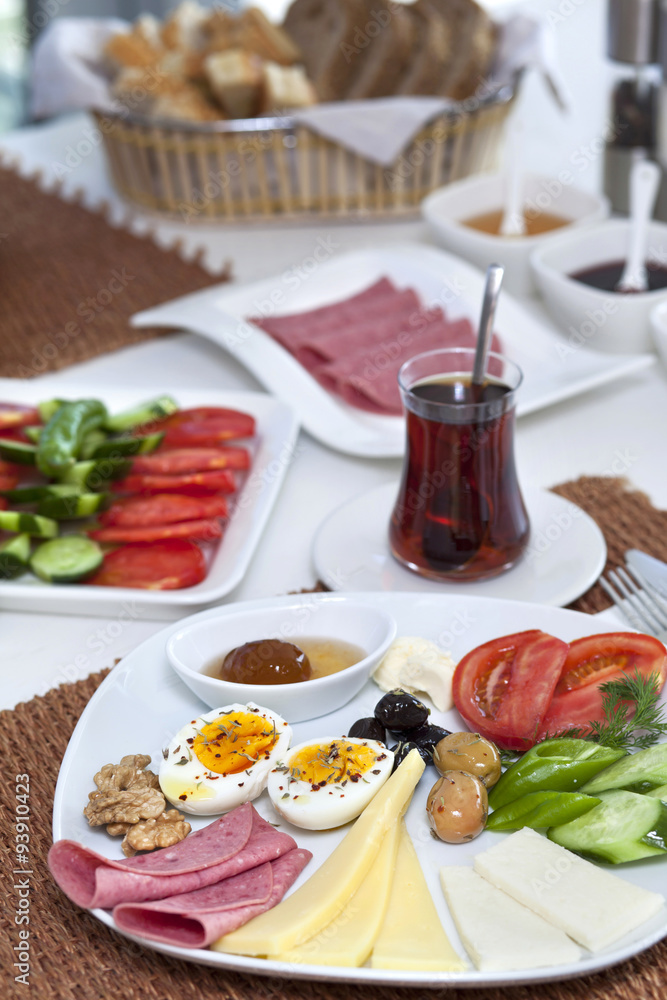 Rich and delicious Turkish breakfast on white wood table