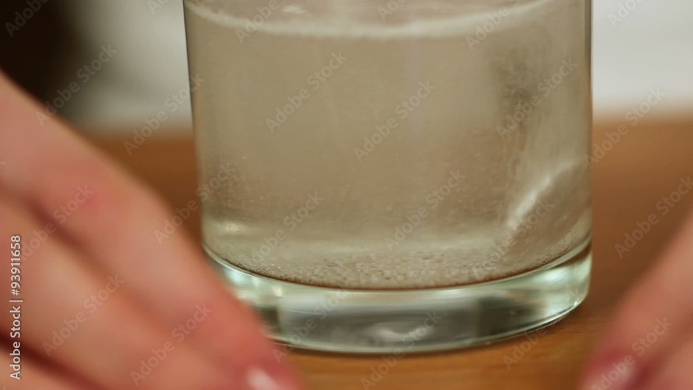 Dissolving effervescent tablet in water glass
Dissolving effervescent tablet in water glass