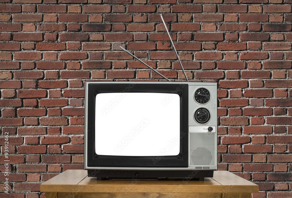 Old Television with Cut Out Screen and Brick Wall