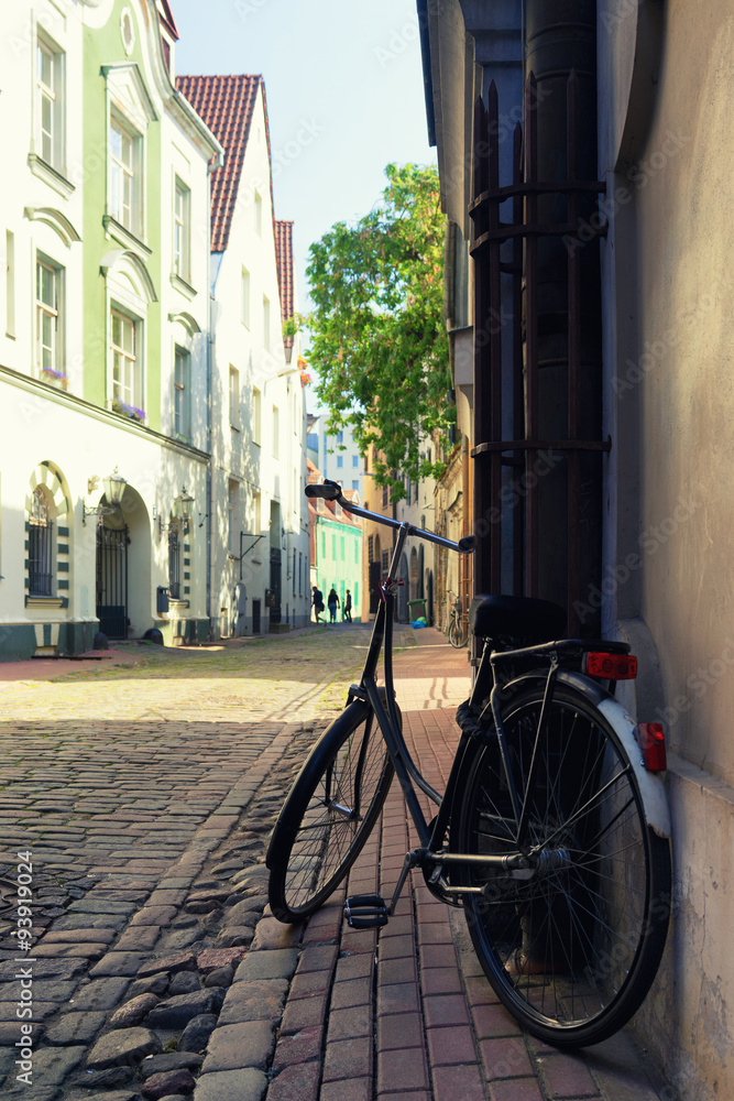Bicycle parked on the street in the old town of Riga